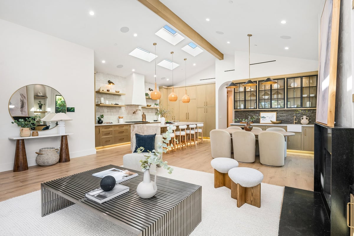 Modern open-concept living space with skylights