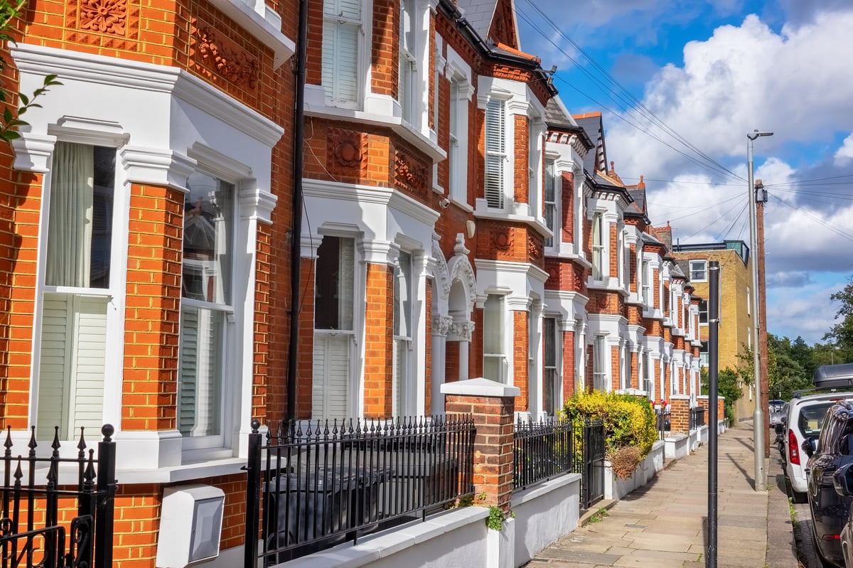 Street with traditional terraced houses. London, England
